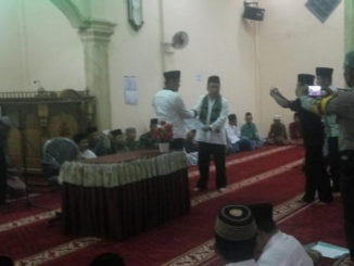 Penyerahan bantuan Pemkab Kerinci.