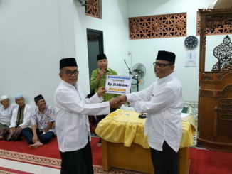 Penyerahan bantuan dari Pemko Payakumbuh.