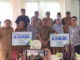 Camat Sungai Tarab bersama penerima santunan dan kepala BPJS Ketenagakerjaan Tanah Datar