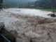 Banjir yang menghanyutkan jembatan di Batu Manjua, Sijunjung.