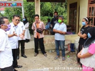 Kunjungan kepada keluarga pasien Covid-19 di Pasaman.