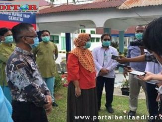 Pasien positif Covid-19 yang dinyatakan sembuh saat diwawancarai wartawan.