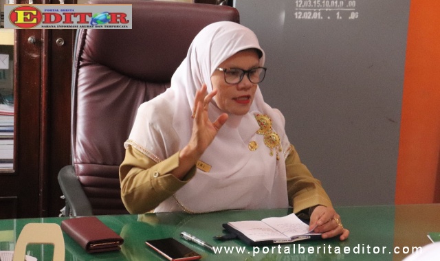 Kepala Dinas Dukcapil Padang Panjang, Maini.