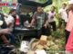 Lokasi mobil Suzuki Karimun terpelosok di parit perkebunan warga bersama barang bukti narkoba jenis daun ganja kering.