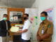 Pnyerahan bantuan maske dari SMK 1 Lubuk Sikaping ke PMI Pasaman.
