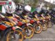 Parkir kendraan plat merah yang tertata rapi.