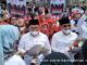 Bapaslon Walikota-Wakil Walikota Bukittinggi Ramlan - Syahrizal diantar ribuan pendukungnya mendaftar Ke KPU Bukittingi.