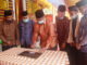 Bupati Gusmal menandatangani prasasti kantor KAN Nagari Aia Batumbuak.