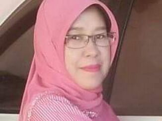 Hj. Eva Angraini.