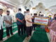 Penyerahan bantuan dari Baznas Kota Bukittinggi.