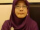 Almarhumah Dra. Nurhayati.