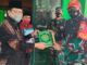 Penyerahan Al Qur'an oleh Kamenag Limapupuh Kota.
