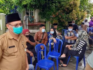 Husin saat di rumah duka