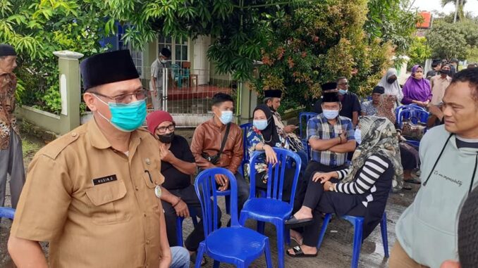 Husin saat di rumah duka