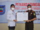 Kepala Kejaksaan Negeri Sawahlunto dan Walikota Sawahlunto selesai penandatanganan Berita Acara Serah Terima Barang Milik Negara.