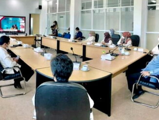 Mengikuti acara HUT ke-64 LAN-RI secara virtual dari ruang VIP Balaikota Padang Panjang.