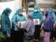 Penyerahan bantuan dari TP PKK Tanah Datar.