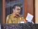 Edisar saat menyampaikan jawaban Pemkab Solok.