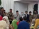 Bupati Agam Andri Warman didaulat memberi sambutan pada resepsi pernikahan putra sulung mantan Sekda Agam Martias Wanto dt.Maruhun.