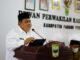 Bupati Padang Pariaman Suhatri Bur sedang menyampaikan jawaban.