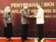 Walikota Sawahlunto saat menerima BKN Award 2021.