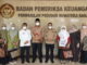 Foto bersama usai penerimaan LHP dari BPK Sumbar.