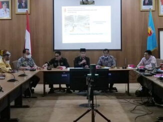 Rapat di kantor Bappeda Kota Solok.