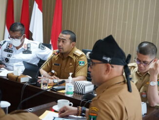 Audy Joinaldy dalam rapat bersama seluruh stakeholder terkait aviasi, imigrasi pariwisata, perhubungan dan kesehatan.