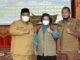 Suhatri Bur Dt. Putiah, SE, MM bersama Ny. Yusrita Suhatri Bur dan Kepala Pelaksana BPBD Padang Pariaman Budi Mulya, ST. M.Eng.