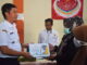 Wali Kota Sawahlunto menyerahkan kembali zakat secara simbolis.