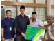 Penyerahan Kartu Kepesertaan BPJS Ketenagakerjaan Oleh Wako Erman Safar