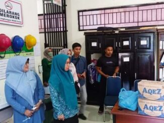Ketua P2TP2A Kota Sawahlunto Ny. Hj. Neldaswenti Zohirin Sayuti