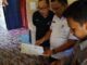 Penyerahan bantuan Kepala Kantor Pos Cabang Utama Padang kepada Pj.Bupati Mentawai