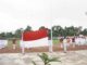Pengibaran Bendera Merah Putih pada upacara peringatan HUT ke-78 di lapangan Singa Harau