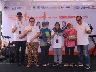 Bank Indonesia KPW Sumbar dengan PT. Pos Indonesia dan Bulog gelar Iven BADUNSANAQ.