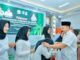 Bupati Batu Bara Resmi Melepaskan 14 Mahasiswai Penerima beasiswa BPDPKS.