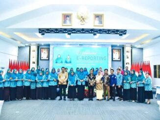 Ketua TP PKK Batu Bara Ny. Hj. Maya Indriasari Zahir, launching sosialisasi aplikasi e-Reporting PKK.