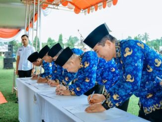 PJ Bupati Batu Bara Nizhamul melaksanakan upacara HKN.