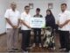 Serah terima santunan kepada ahli waris Almarhum Busra.