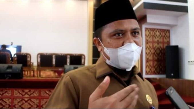 Ermizen, Ketua DPRD Pessel.
