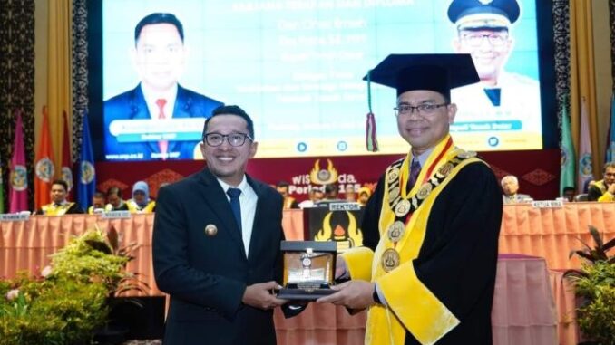 Bupati Eka Putra diundang untuk Orasi Ilmiah di UNP Padang.