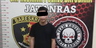 Tersangka pelecehan anak di bawah umur yang berinisial MI.