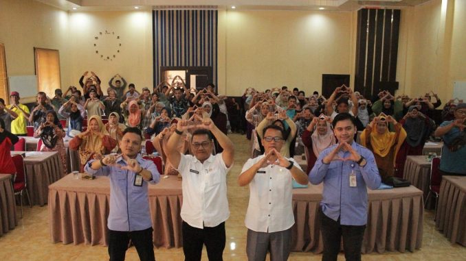 Kepala Dinas PKP Kota Payakumbuh, Marta Minanda, memberikan pemaparan dalam sosialisasi program bantuan stimulan perbaikan RTLH.